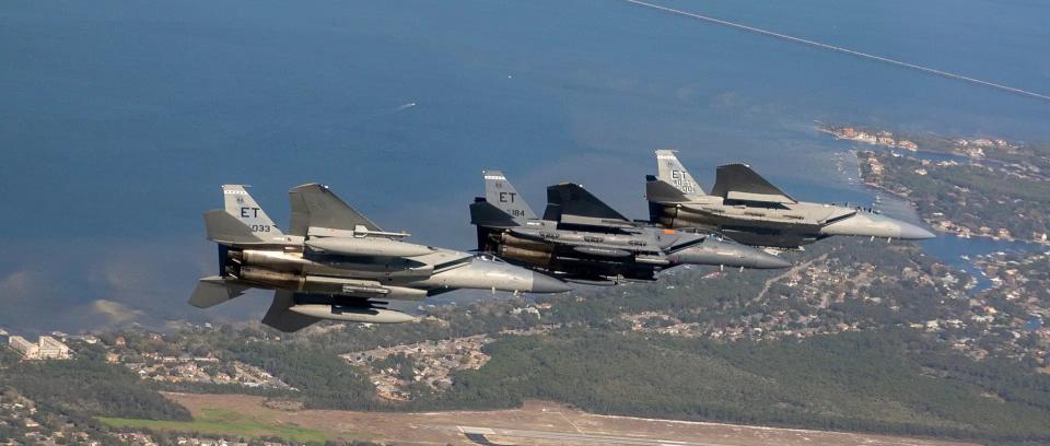 From right to left, an F-15C Eagle, an F-15EX Strike Eagle, and an F-15EX Eagle II. <em>USAF</em>