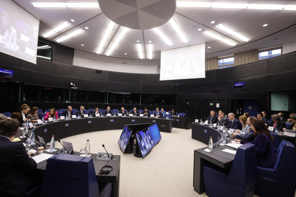 Roberta Metsola, President of European Parliament, third right, meets the presidents of political groups in a special meeting to decide the impeachment of the vice president Eva Kaili, at the European Parliament in Strasbourg, eastern France, Tuesday Dec 13, 2022. The European Union's parliament was reeling Tuesday, it's credibility under threat, as a corruption and bribery scandal damaged lawmakers' careers and fingers pointed at Qatari officials accused of seeking to play down labor rights concerns ahead of the soccer World Cup. (AP Photo/Jean-Francois Badias)