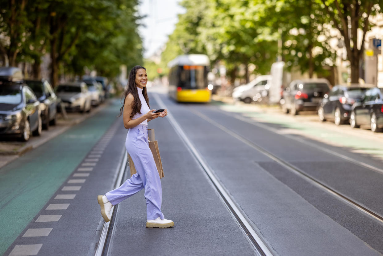 Woman crossing the street