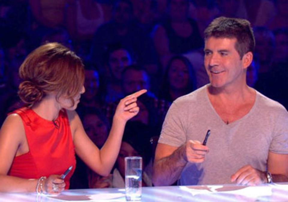 Cowell pictured with former X Factor judge Cheryl Cole in  2010 (ITV)