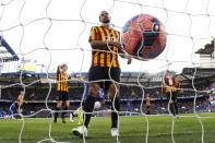 Bradford City players react after Chelsea's Gary Cahill (not pictured) scores during their FA Cup fourth round soccer match at Stamford Bridge in London January 24, 2015. REUTERS/Stefan Wermuth (BRITAIN - Tags: SPORT SOCCER)