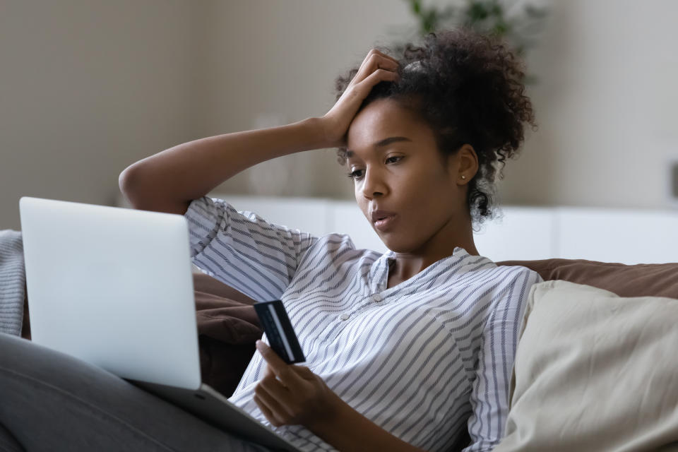 young woman looking at her finances