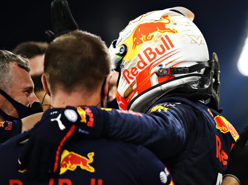 Max Verstappen and members of his Red Bull team celebrate their qualifying success in Abu Dhabi (Getty Images)