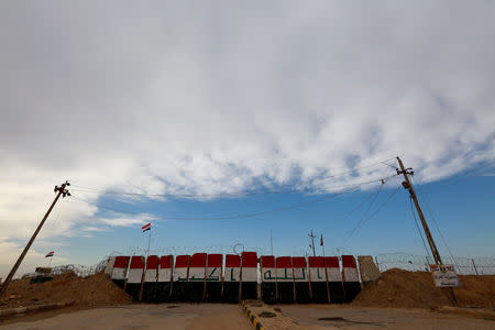 The al-Qaim gate is closed at the border between Iraq and Syria at al-Qaim in Iraq, November 27, 2018. REUTERS/Alaa al-Marjani