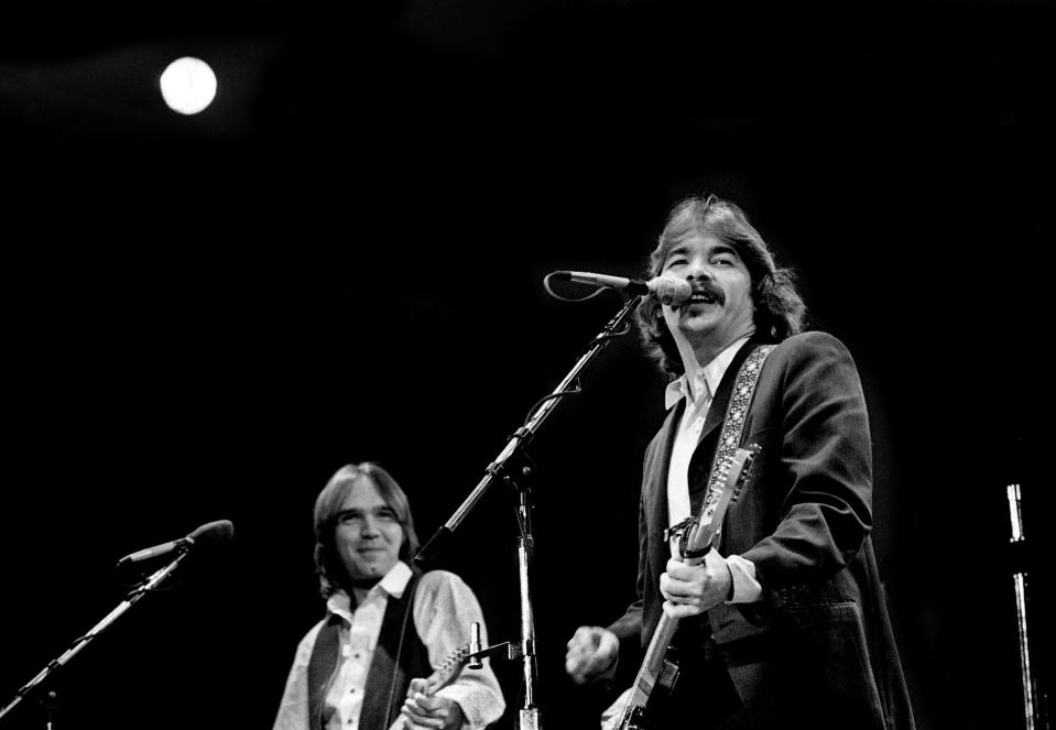 John Prine, right, one of the earlier acts, performs for a crowd of more than 10,000 during Charlie Daniels Band's 6th annual Volunteer Jam at the Municipal Auditorium Jan. 12, 1980.