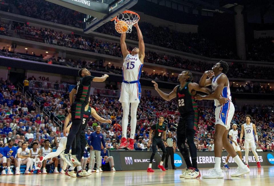 Kansas guard Kevin McCullar Jr. (15) dunks against Howard during a first-round college basketball game in the NCAA Tournament Thursday, March 16, 2023, in Des Moines, Iowa.