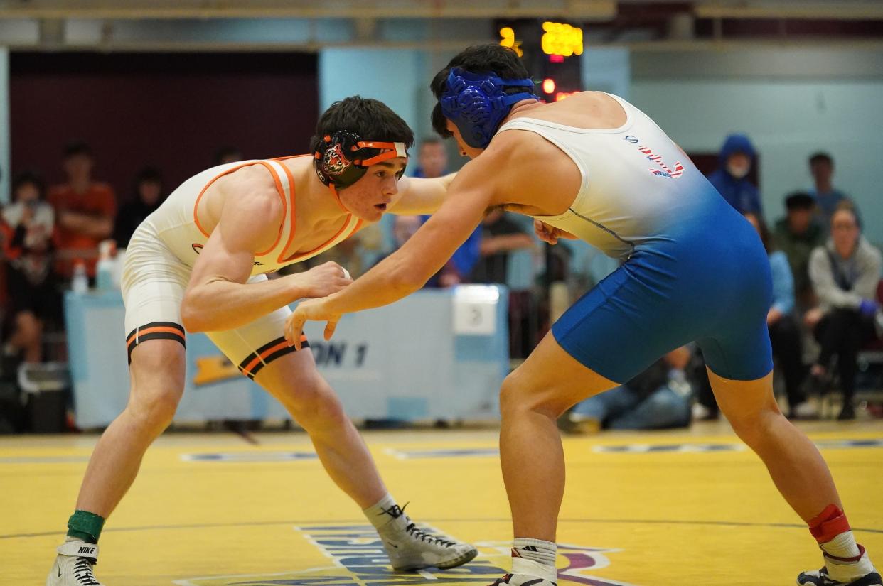 Croton-Harmon's Henry Martin wrestles Hen Hud's Ismael Andrade in the 152-pound championship match at the Section 1, Division II wrestling championships at Westchester County Center on Saturday, Feb. 10, 2024.