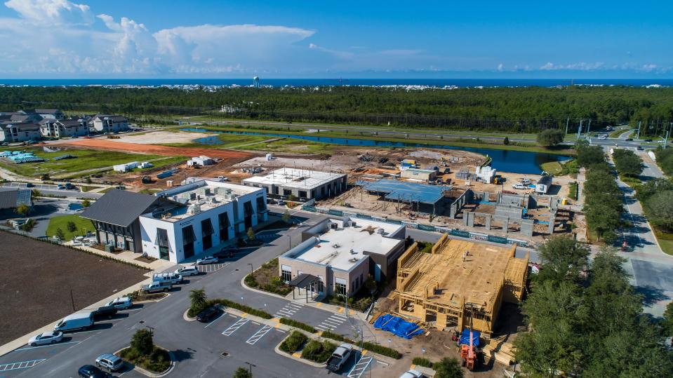 Construction is underway at the Watersound Town Center as St. Joe Company announces the development of new businesses in the center.