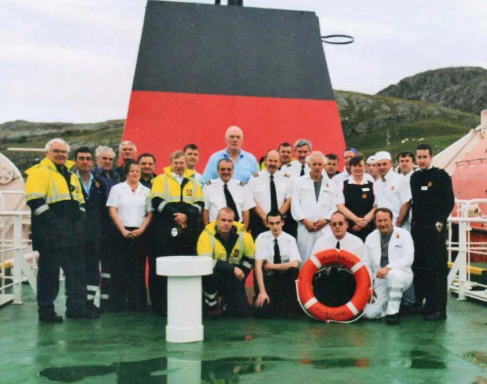 HeraldScotland: Captain Guy Robertson with crew of the 1998 Clansman at Lochmaddy in 2003