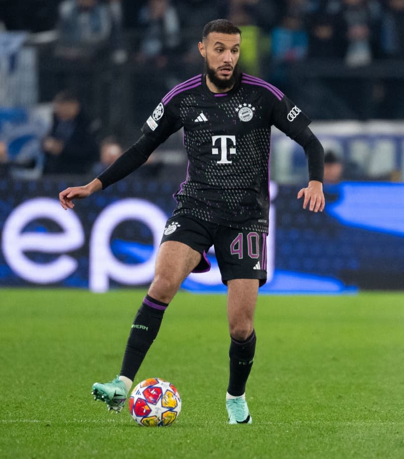 Bayern's Noussair Mazraoui in action UEFA Champions League soccer match between Lazio Rome and Bayern Munich at the Stadio Olimpico di Roma. Winger Kingsley Coman and full back Noussair Mazraoui returned to Bayern Munich team training from injuries on Tuesday and could play again after the international break. Sven Hoppe/dpa