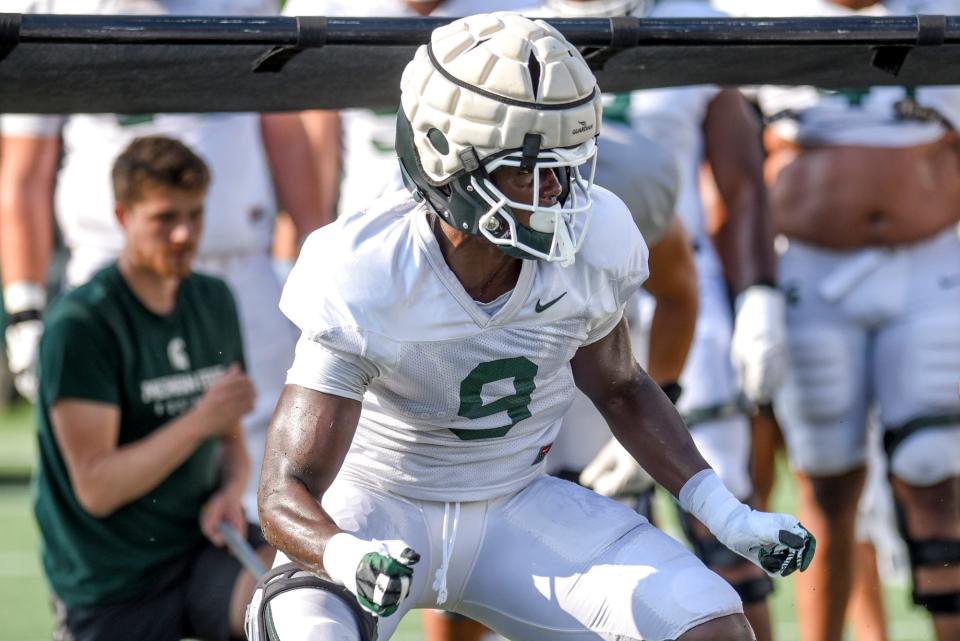 Michigan State's defensive lineman Zion Young runs a drill during football practice on Wednesday, Aug. 9, 2023, in East Lansing.