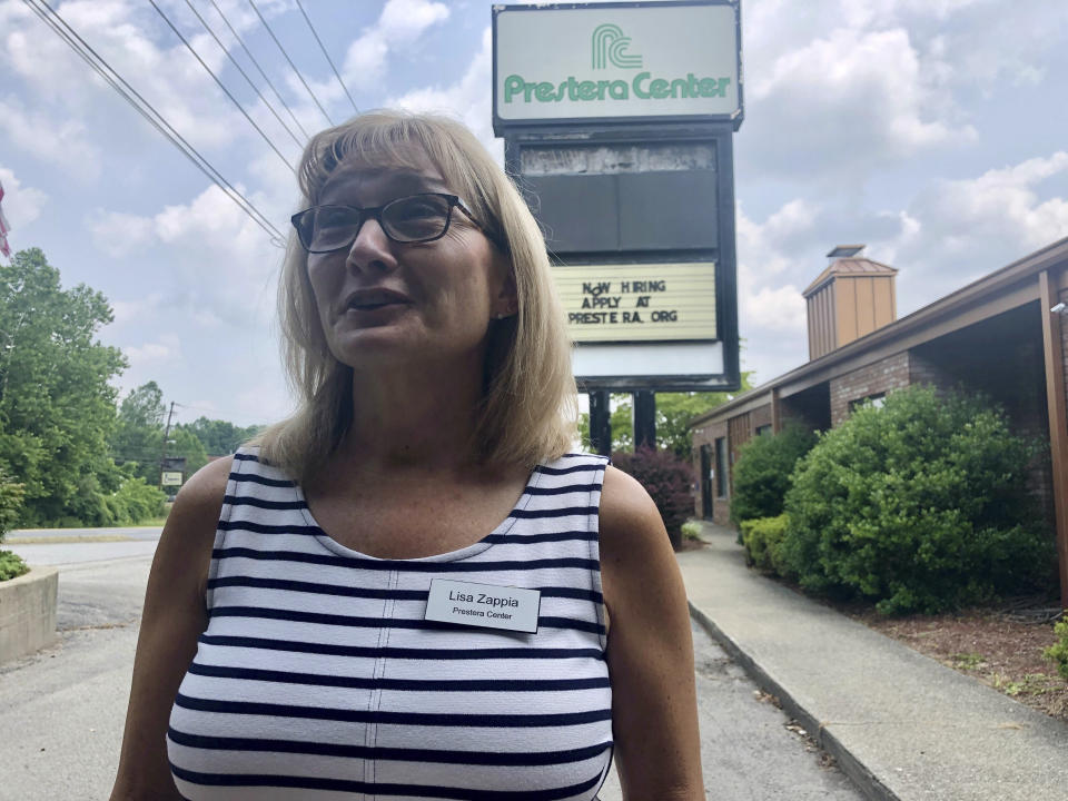 Lisa Zappia, chief executive officer of mental health and addiction treatment services provider Prestera Center, speaks during an interview Wednesday, July 21, 2021, at her office in Huntington, W.Va. In one of the epicenters of the U.S. opioid explosion, the nonprofit group really could use some money. Whether from a potential national settlement deal with big U.S. drug distribution companies or from some other source, an infusion of cash would help stem the tide of losses in staffing and other areas in recent years, along with the strain caused by the coronavirus pandemic. (AP Photo/John Raby)