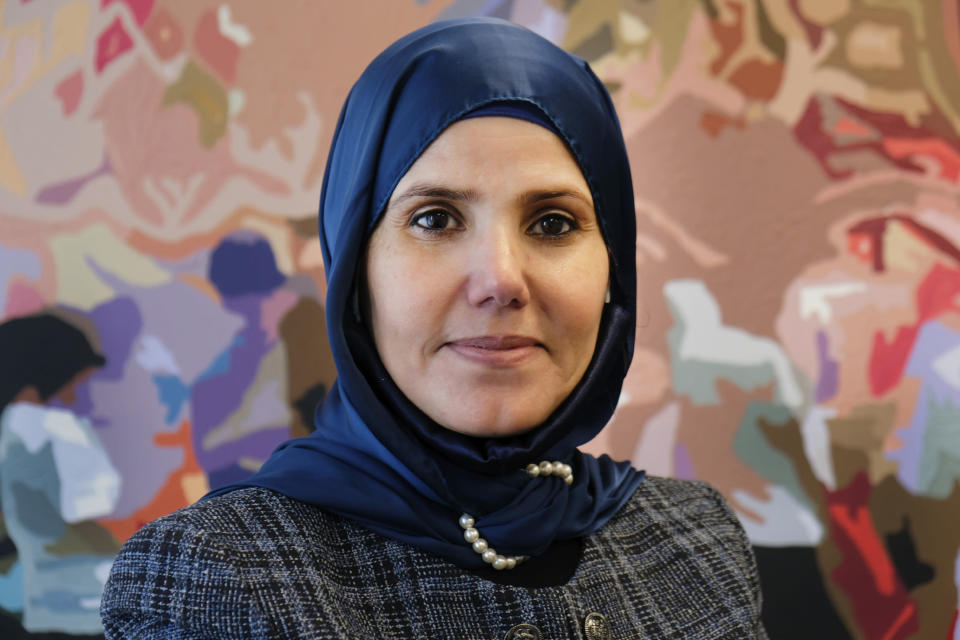Samia Omar, Harvard University's first Muslim woman chaplain, poses for a photo at the school's office for Muslim chaplains in Cambridge, Mass., Nov. 30, 2021. Omar organizes a weekly discussion group for Muslim women on campus. (Aysha Khan/Religion News Service via AP)