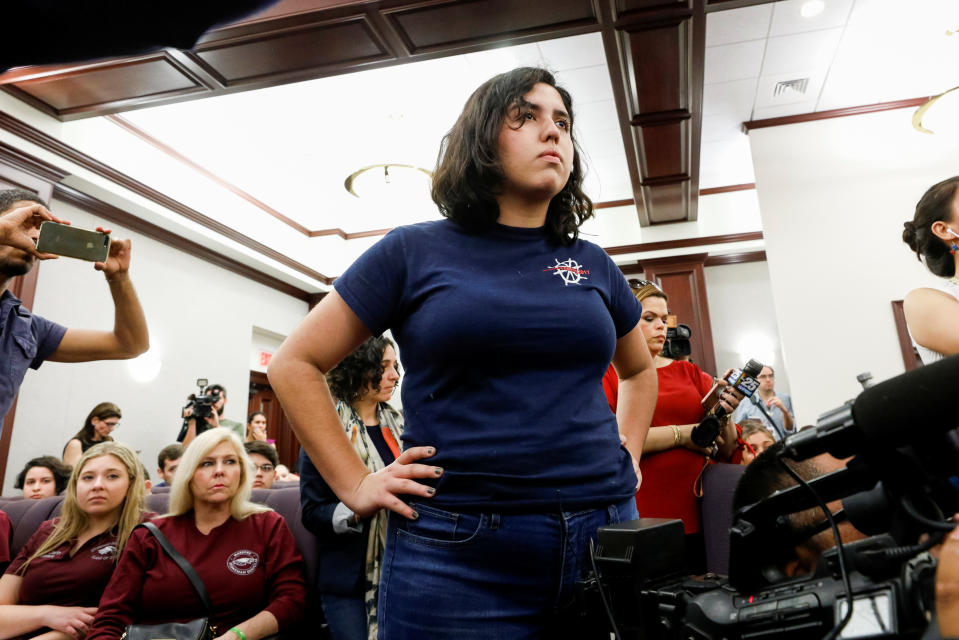 <p>Marjory Stoneman Douglas High School student Isabella Pfeiffer, age 16, listens to answers from leaders of the Florida Senate about changing laws controlling assault weapons, following last week’s mass shooting on their campus, at the Capitol in Tallahassee, Fla., Feb. 21, 2018. (Photo: Colin Hackley/Reuters) </p>