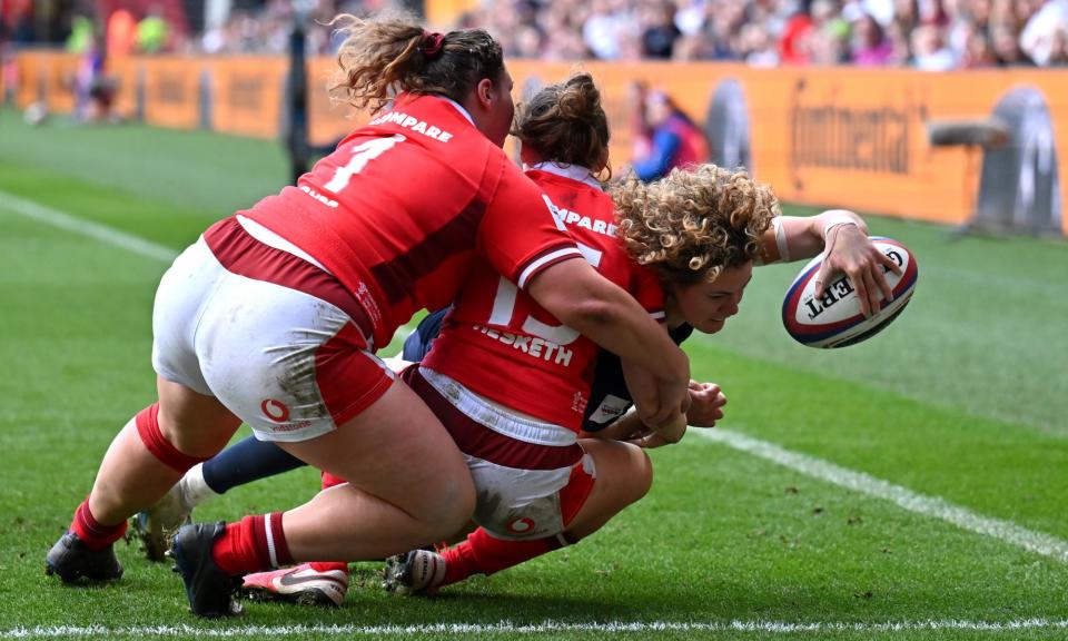 <span>Ellie Kildunne powers in at the corner to score her team's fifth try.</span><span>Photograph: Dan Mullan/Getty Images</span>