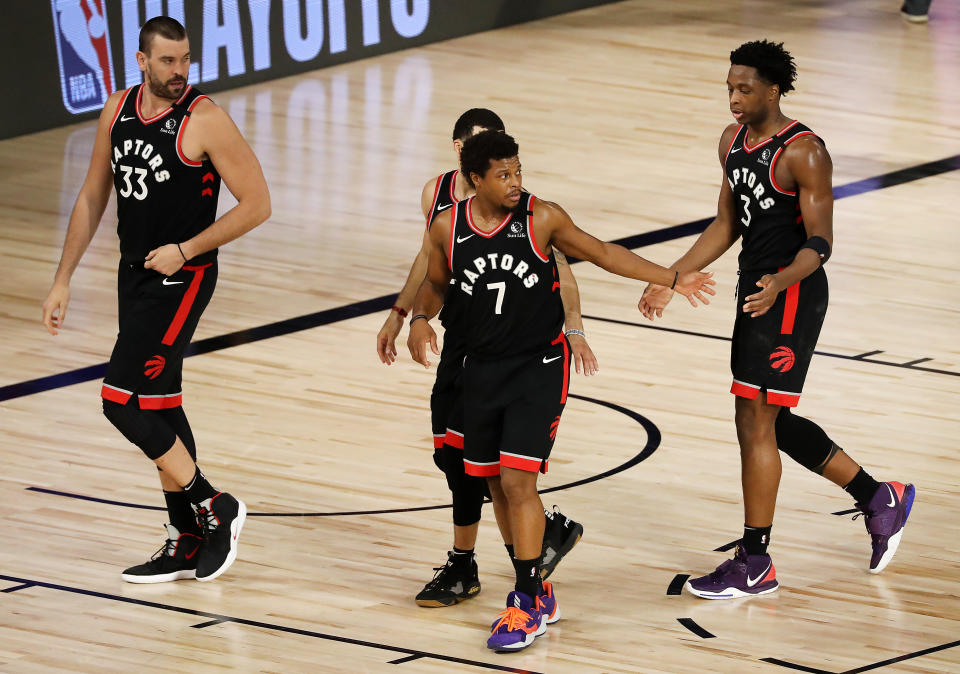 Kyle Lowry #7 of the Toronto Raptors reacts after their win against the Boston Celtics during double overtime in Game Six.