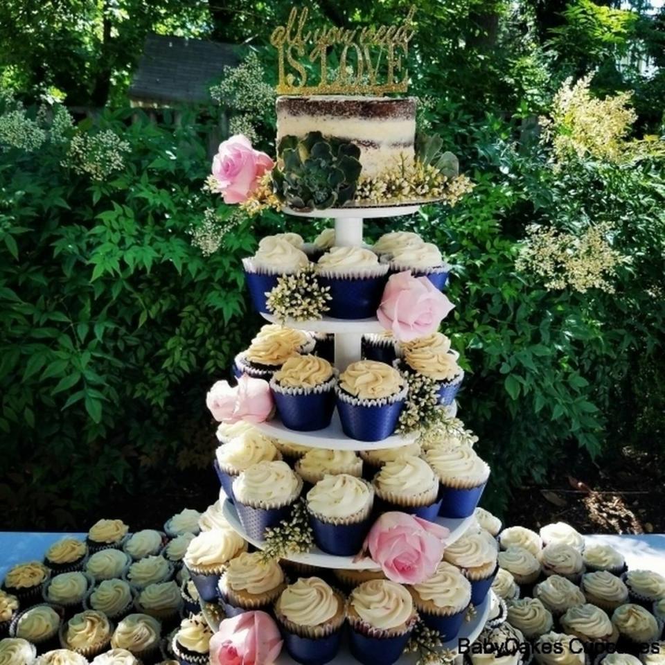 BabyCakes Cupcakes offers cupcake towers and cutting cakes for weddings that are baked fresh on the big day.