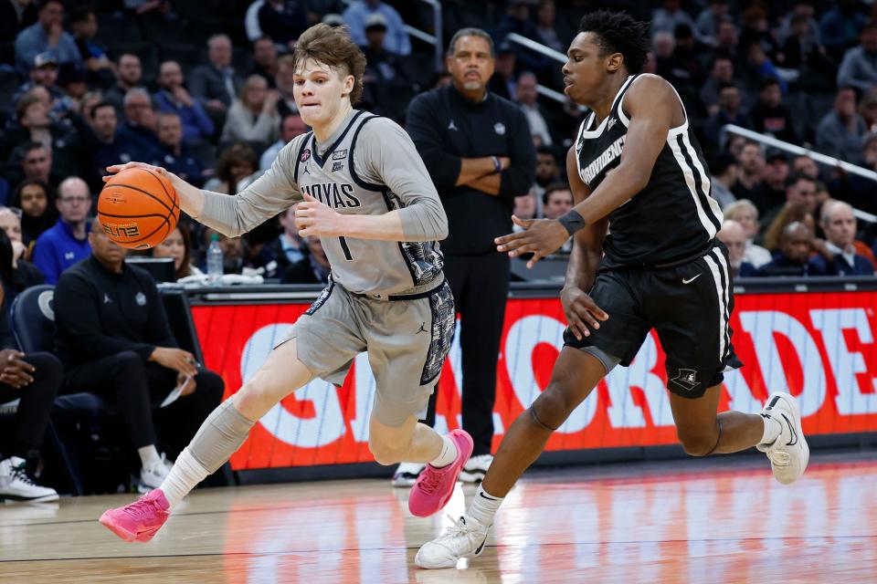 Georgetown guard Rowan Brumbaugh drives to the basket as Providence guard Jayden Pierre defends during the second half Tuesday in Washington, D.C.