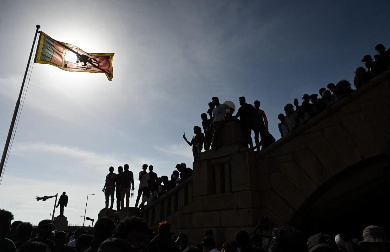 The sun sets on Sri Lanka's protest movement (for now). <a href="https://www.gettyimages.com/detail/news-photo/protestors-gather-at-presidential-secretariat-in-colombo-on-news-photo/1241898185?adppopup=true" rel="nofollow noopener" target="_blank" data-ylk="slk:Arun Sankar/AFP via Getty Images);elm:context_link;itc:0;sec:content-canvas" class="link ">Arun Sankar/AFP via Getty Images)</a>