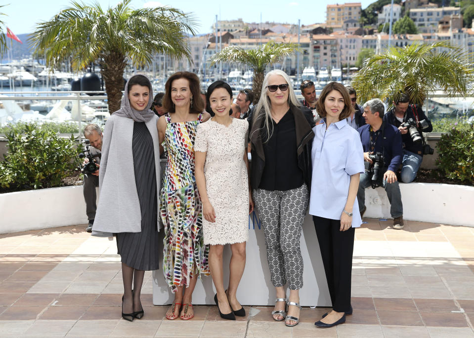 President of the jury Jane Campion, second right, poses with members of the jury from left, Leila Hatami, Carole Bouquet, Jeon Do-yeon and Sofia Coppola during a photo call for members of the jury at the 67th international film festival, Cannes, southern France, Wednesday, May 14, 2014. (AP Photo/Alastair Grant)