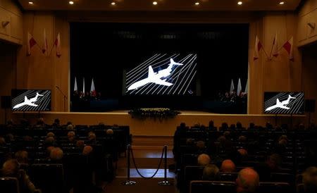 A movie is projected during a new Polish government commission statement on the seventh anniversary of the crash of the Polish government plane in Smolensk, Russia, that killed 96 people on board including late President Lech Kaczynski and his wife Maria, in Warsaw, Poland April 10, 2017. REUTERS/Kacper Pempel