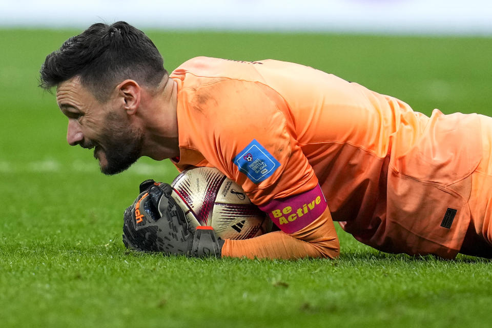 France's goalkeeper Hugo Lloris embraces the ball during the World Cup semifinal soccer match between France and Morocco at the Al Bayt Stadium in Al Khor, Qatar, Wednesday, Dec. 14, 2022. (AP Photo/Natacha Pisarenko)