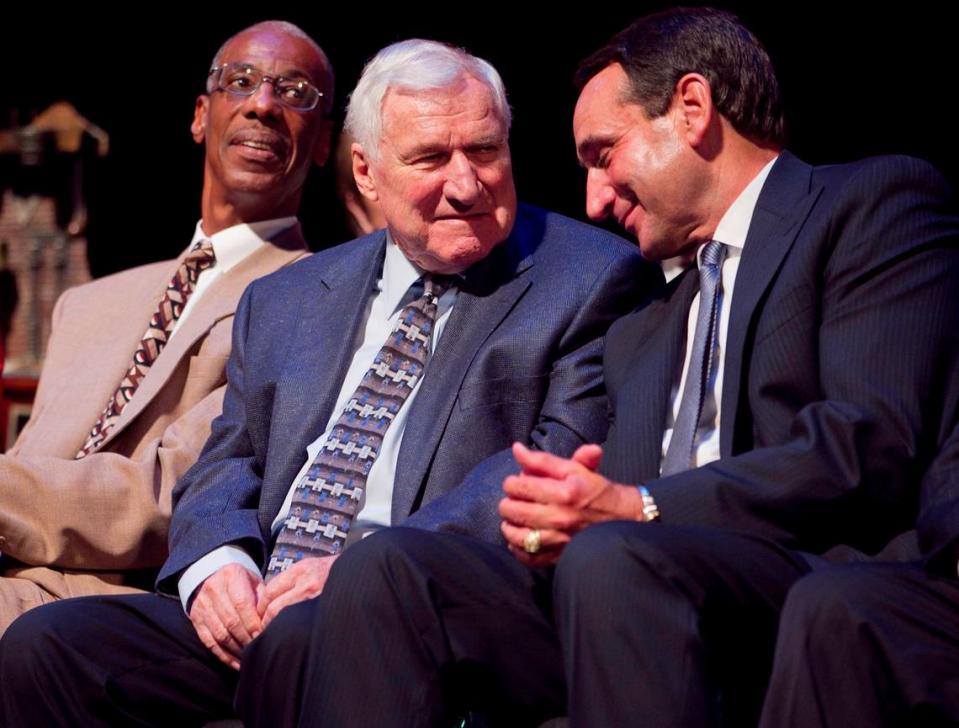 Duke coach Mike Krzyzewski acknowledges former UNC coach Dean Smith as he is honored with the Dr. James A. Naismith Good Sportsmanship Award on Wednesday June 29, 2011 at Memorial Auditorium in Raleigh, N.C. Robert Willett/2011 News & Observer file photo
