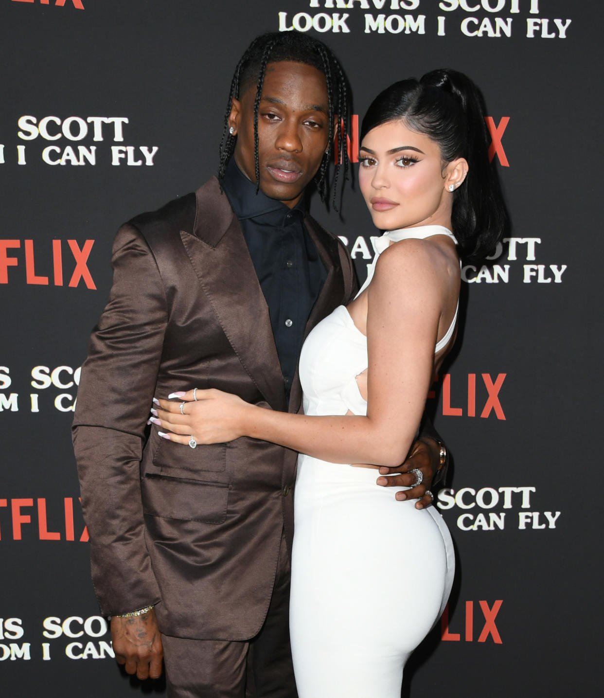 SANTA MONICA, CALIFORNIA - AUGUST 27:  Travis Scott and Kylie Jenner attend the Premiere Of Netflix's "Travis Scott: Look Mom I Can Fly" at Barker Hangar on August 27, 2019 in Santa Monica, California. (Photo by Jon Kopaloff/FilmMagic)