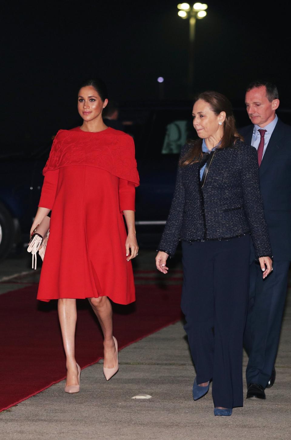 Meghan wore a red Valentino dress for her arrival in Morocco (PA)