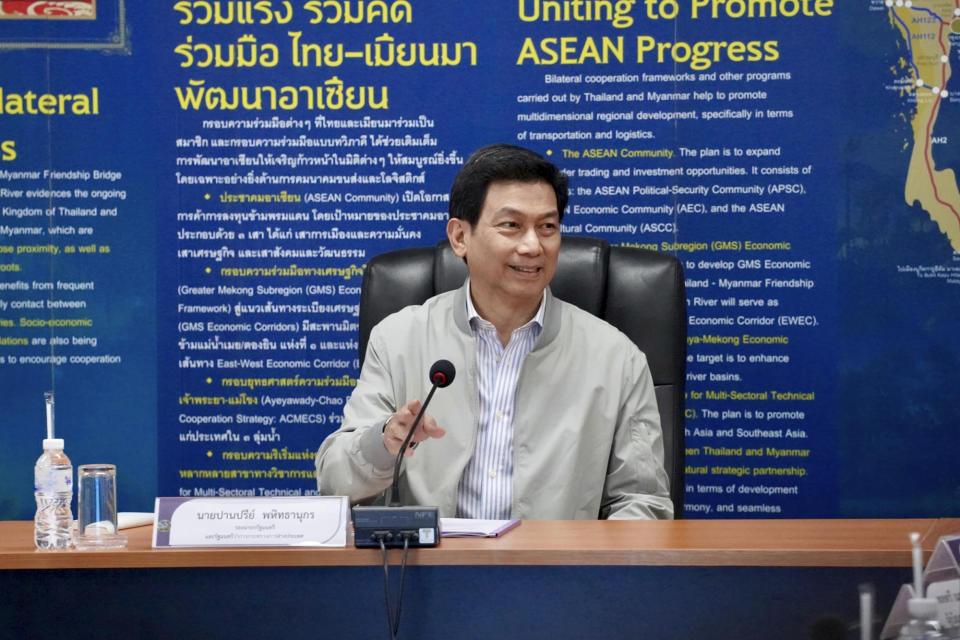 Thailand's Foreign Minister Parnpree Bahiddha-Nukara meets the media at a customs checkpoint near the border with Myanmar, in Mae Sot, Thailand on Thursday, Feb. 8, 2024. Parnpree was inspecting the area, which will be a staging point for sending cross-border humanitarian assistance to war-wracked Myanmar, which he said would begin in about a month. (AP Photo/Jintamas Saksornchai)