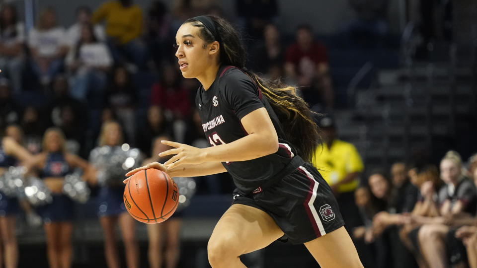 South Carolina guard Brea Beal (12) dribbles up court during an NCAA college basketball game against Mississippi, Sunday, Feb. 19, 2023, in Oxford, Miss. South Carolina won in overtime 64-57. (AP Photo/Rogelio V. Solis)