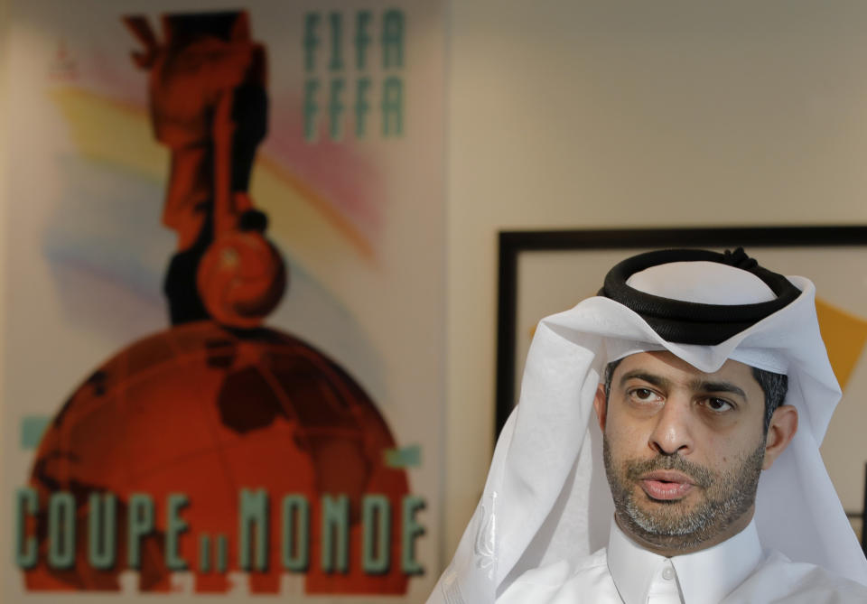 In this Monday, Oct. 29, 2018 picture, Nasser al-Khater, deputy-secretary general of the World Cup organizing committee, speaks during an interview with the Associated Press at the Supreme Committee for Delivery and Legacy in Doha, Qatar. Eight stadiums scattered in a 30-mile radius that will host 32 teams from across the planet are in various stages of development, most of them trying to walk the treacherous line of paying homage to the region's history while simultaneously avoiding becoming an expensive and unused relic once the party ends and everyone else goes home. (AP Photo/Vadim Ghirda)