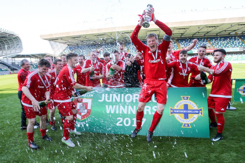 Willie Burleigh and Enniskillen Rangers celebrate after winning the Irish Junior Cup final in 2017