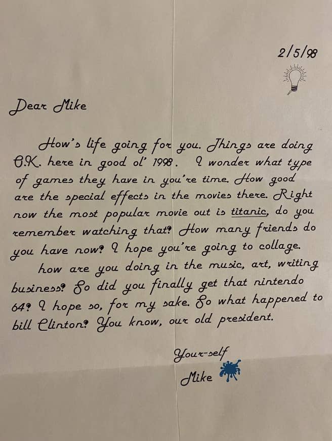 A handwritten letter dated 2/5/98 from Mike to Mike. The letter discusses life in 1998, movies like Titanic, games, college, and mentions Bill Clinton