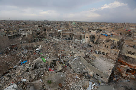 General view of destroyed buildings in the old city of Mosul, Iraq February 24, 2018. REUTERS/Ari Jalal/Files