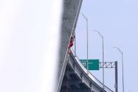 Greenpeace USA climbers form a blockade on the Fred Hartman Bridge, near Baytown