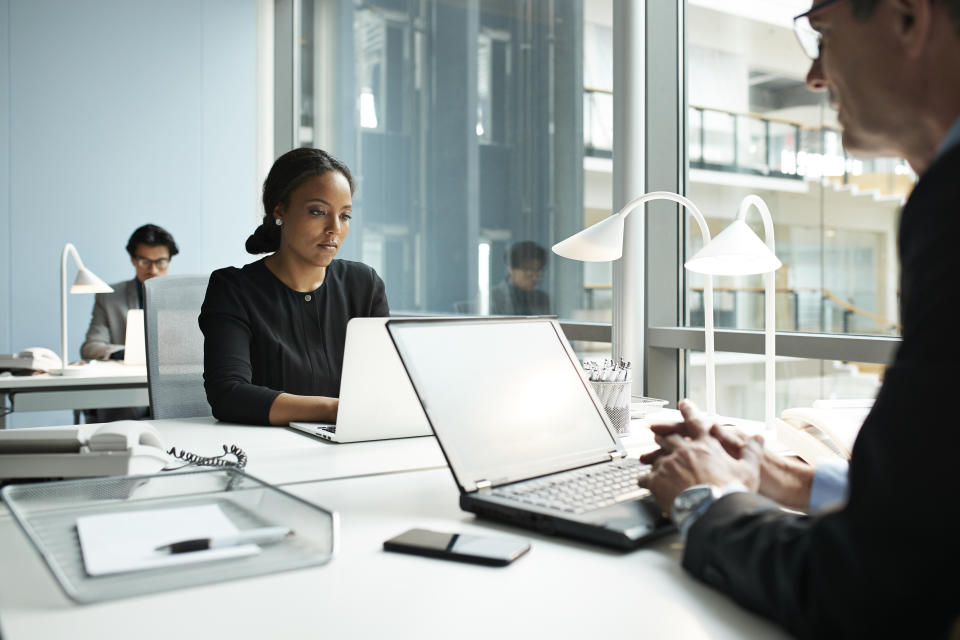 Recent studies show hot desking has both negative and positive impact on productivity and staff morale. Photo: Getty