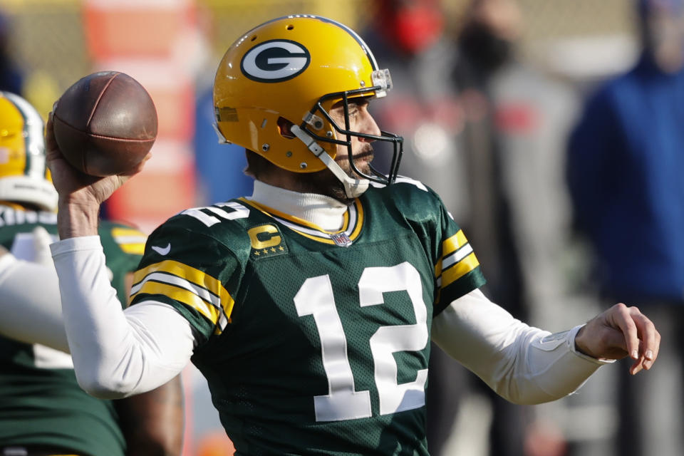 Green Bay Packers quarterback Aaron Rodgers passes during the first half of the NFC championship NFL football game against the Tampa Bay Buccaneers in Green Bay, Wis., Sunday, Jan. 24, 2021. (AP Photo/Jeffrey Phelps)