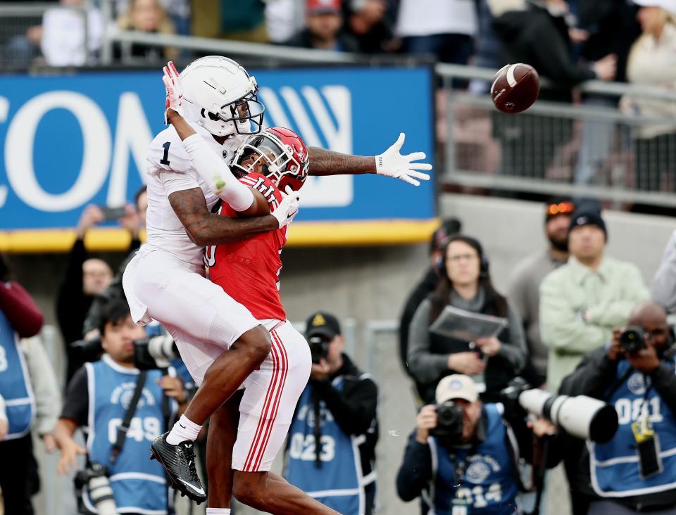 Utah Utes CB Zemaiah Vaughn (16) is called for pass interference on Penn State Nittany Lions WR KeAndre Lambert-Smith in the end zone as Utah and Penn State play in the Rose Bowl in Pasadena, California, on Monday, Jan. 2, 2023. | Scott G Winterton, Deseret News