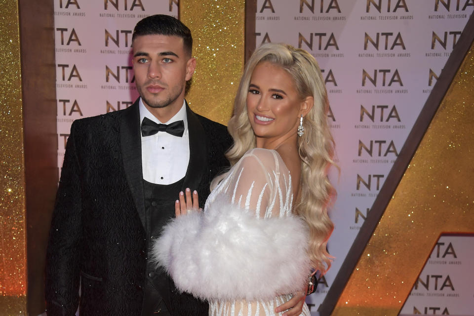 Molly-Mae Hague cuddles up to Tommy Fury 