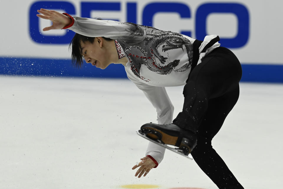 Vincent Zhou competes in the men's free skate program during the U.S. Figure Skating Championships Sunday, Jan. 9, 2022, in Nashville, Tenn. (AP Photo/Mark Zaleski)