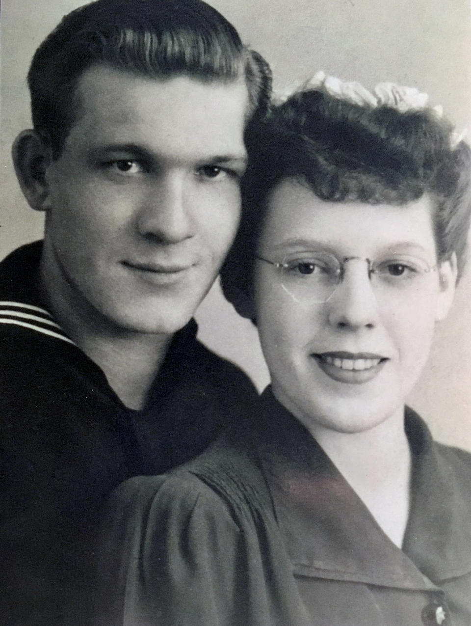 This Jan. 21, 1944, photo, provided by Debbie Hodges shows Julian and Jacqueline Hodges on their wedding day in Lewiston, Mont. Julian Hodges, now of Johnson City, Tenn., is believed to be one of the last two men alive of the 4,600 servicemen who between 1937 and 1942 served aboard the USS Yorktown, an aircraft carrier sunk by a Japanese submarine following the June 1942 Battle of Midway. (Courtesy of Debbie Hodges via AP)