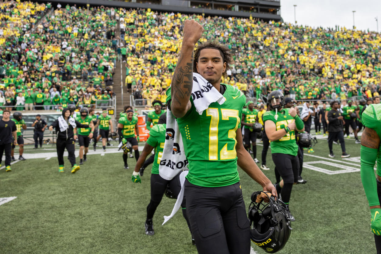 EUGENE, OREGON - SEPTEMBER 23: Defensive back Bryan Addison #13 of the Oregon Ducks celebrates against the Colorado Buffaloes after their 42-6 victory at Autzen Stadium on September 23, 2023 in Eugene, Oregon. (Photo by Tom Hauck/Getty Images)