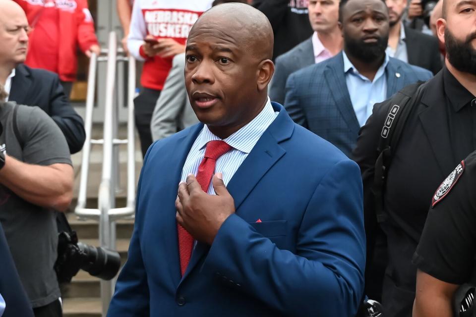 Interim head coach Mickey Joseph of the Nebraska Cornhuskers walks with the team to the stadium before the game against the Oklahoma Sooners at Memorial Stadium on September 17, 2022 in Lincoln, Nebraska.