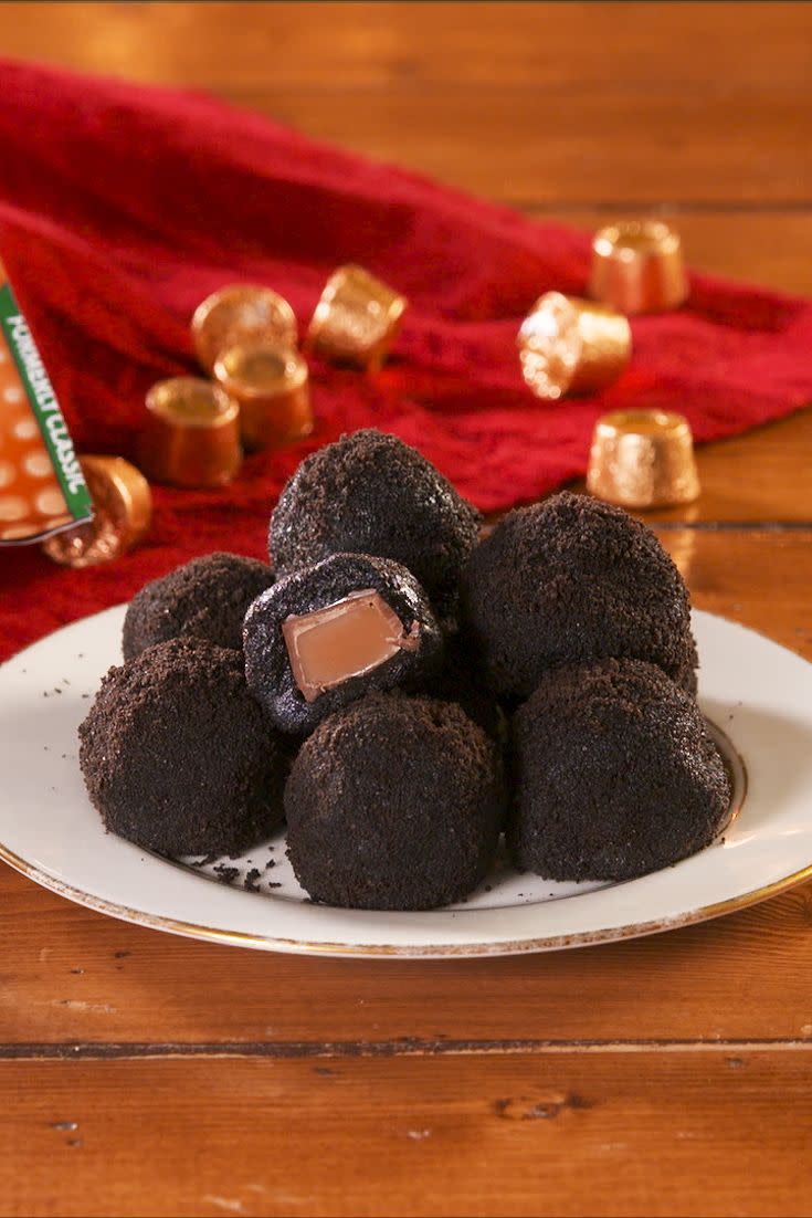 <p>An <a href="https://www.delish.com/uk/cooking/recipes/a28826643/best-oreo-cookie-balls-recipe/" rel="nofollow noopener" target="_blank" data-ylk="slk:Oreo truffle;elm:context_link;itc:0;sec:content-canvas" class="link ">Oreo truffle</a> stuffed with a Rolo? Why have we not done this before? The caramel centre is a very welcomed surprise and makes for our favourite truffle to date. </p><p>Get the <a href="https://www.delish.com/uk/cooking/recipes/a30283324/rolo-truffles-recipe/" rel="nofollow noopener" target="_blank" data-ylk="slk:Rolo Truffles;elm:context_link;itc:0;sec:content-canvas" class="link ">Rolo Truffles</a> recipe.</p>