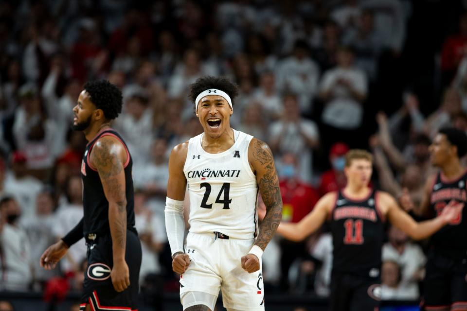 Cincinnati Bearcats guard Jeremiah Davenport (24) celebrates after a defensive stop in the second half of the NCAA men's basketball game on Saturday, Nov. 13, 2021, at Fifth Third Arena in Cincinnati. Cincinnati Bearcats defeated Georgia Bulldogs 73-68.