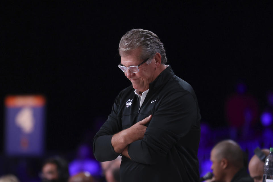 In this photo provided by Bahamas Visual Services, UConn head coach Geno Auriemma reacts during an NCAA college basketball game against South Carolina at Paradise Island, Bahamas, Monday, Nov. 22, 2021. No. 1 South Carolina beat second-ranked UConn 73-57 to win the inaugural Battle 4 Atlantis tournament championship. (Tim Aylen/Bahamas Visual Services via AP)