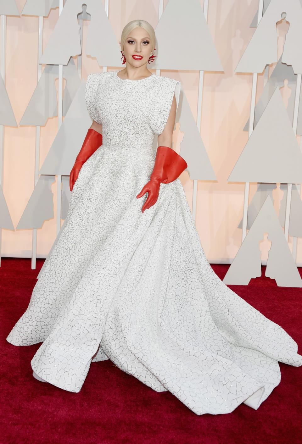 <p>Rubber gloves? Yes, exactly what this designer ball gown for the Oscars was missing… [Photo: Getty] </p>