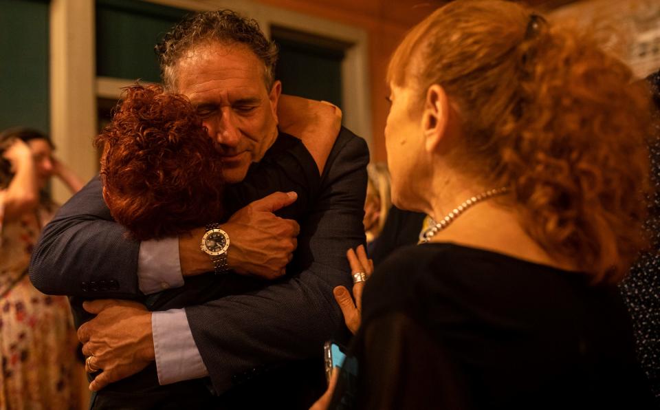 Andy Levin hugs a supporter after losing Michigan's District 11th race to Congresswoman Haley Stevens in Pontiac on Aug. 2, 2022.