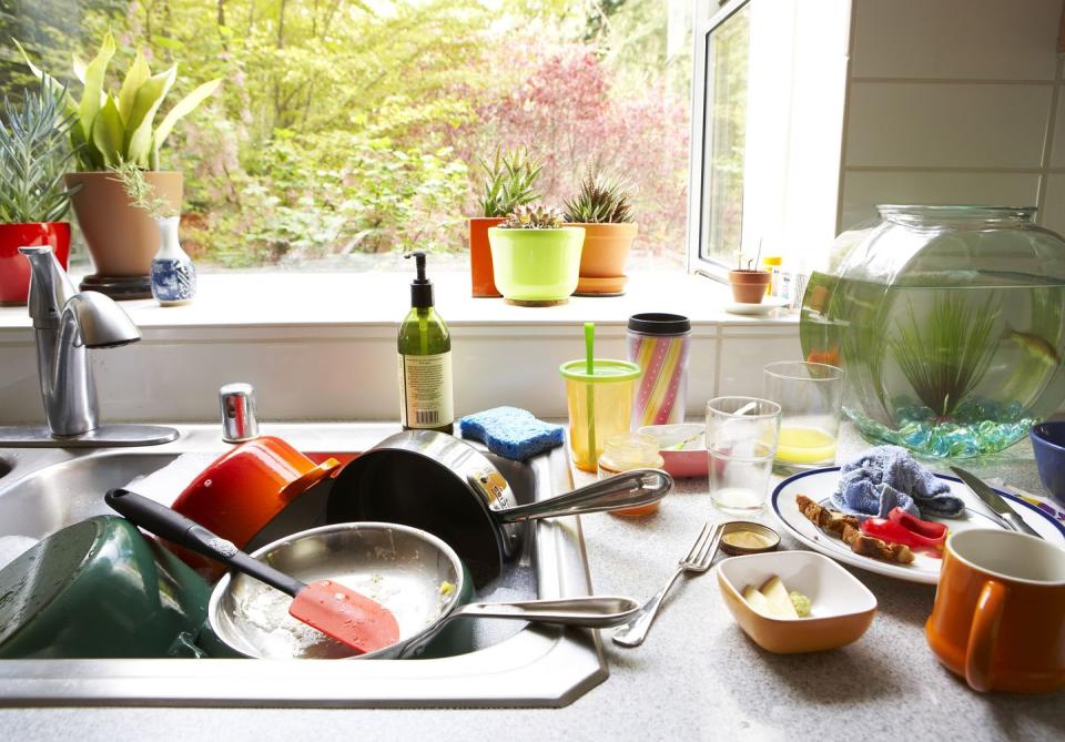 There are dirty dishes are piled high.